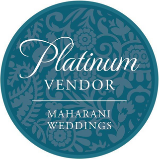 A circular logo featuring elegant floral patterns, with the text "Platinum Vendor" and "Maharani Hochzeiten" in stylish fonts.